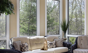 Sun room in luxury home with circular window